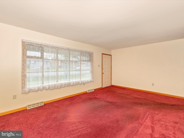 view of carpeted spare room