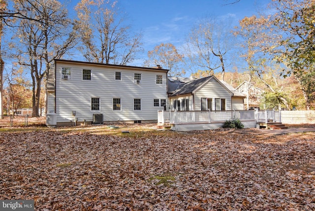 back of property featuring a deck and central air condition unit