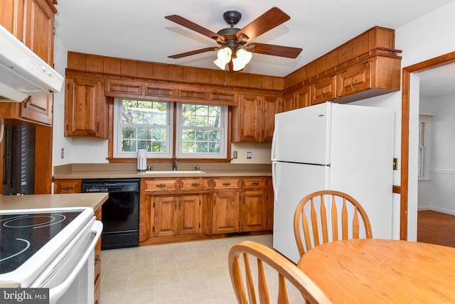 kitchen featuring ceiling fan, range hood, white appliances, and sink