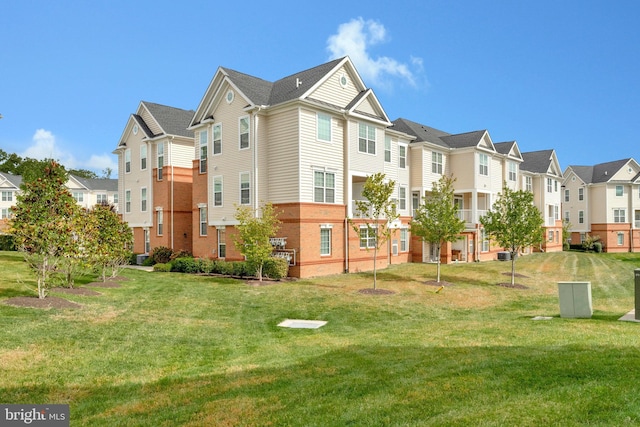 view of community featuring a yard