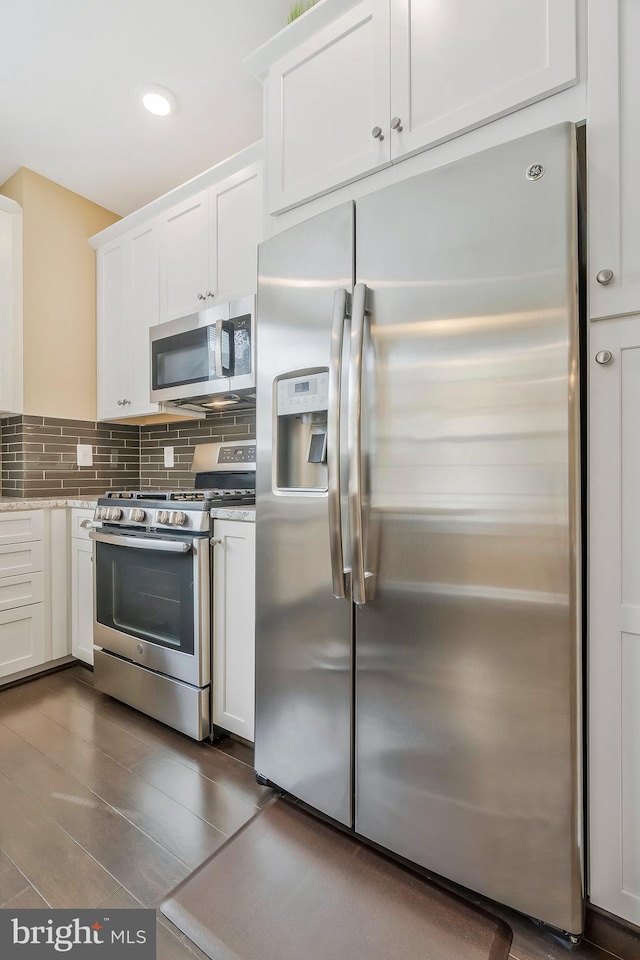 kitchen featuring white cabinets and stainless steel appliances