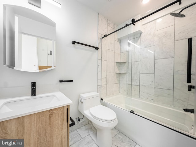 full bathroom with bath / shower combo with glass door, vanity, and toilet