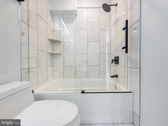 bathroom featuring toilet and combined bath / shower with glass door