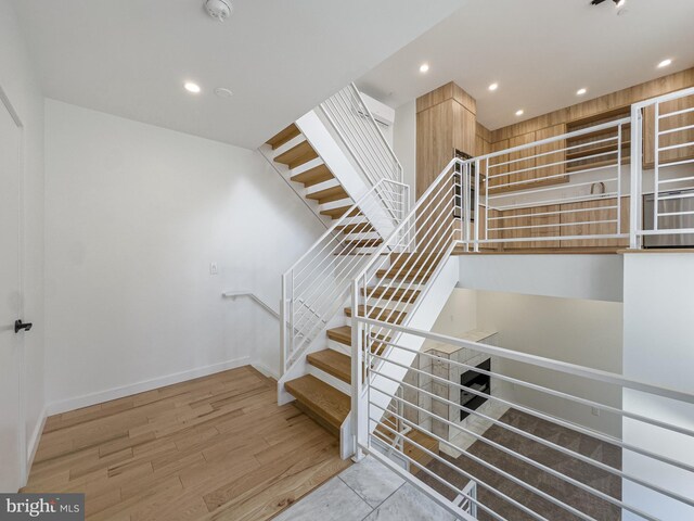 1607 Germantown Ave, Philadelphia, PA 19122 - staircase with wood finished floors, baseboards, and recessed lighting