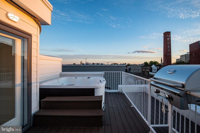 1607 Germantown Ave, Philadelphia, PA 19122 - deck at dusk with a hot tub and grilling area