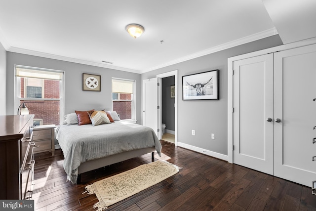 bedroom featuring multiple windows, crown molding, and dark hardwood / wood-style flooring