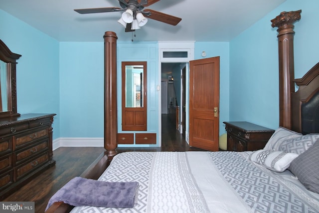 bedroom featuring dark hardwood / wood-style flooring and ceiling fan