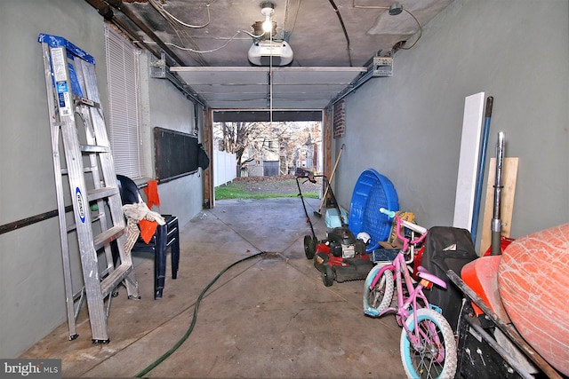 garage featuring a garage door opener