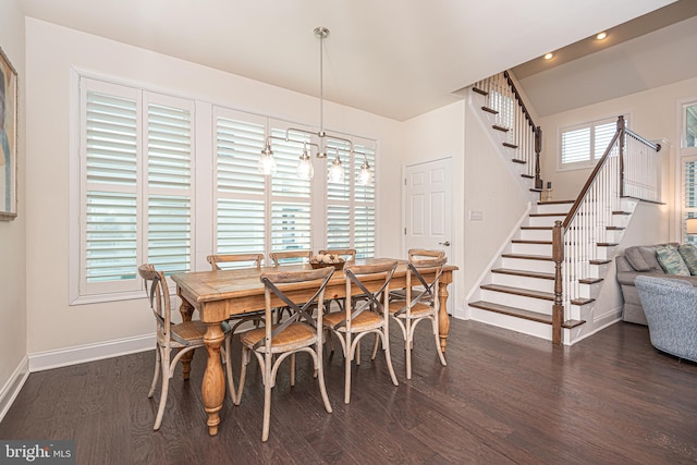 dining area featuring dark hardwood / wood-style flooring