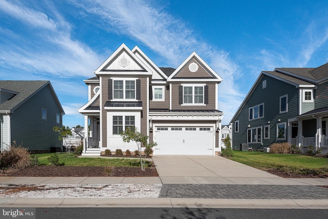 view of front of house with central AC, a garage, and a front lawn