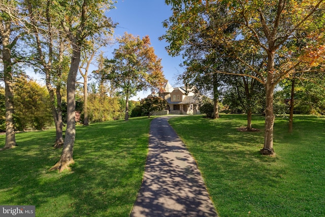 exterior space with a front lawn