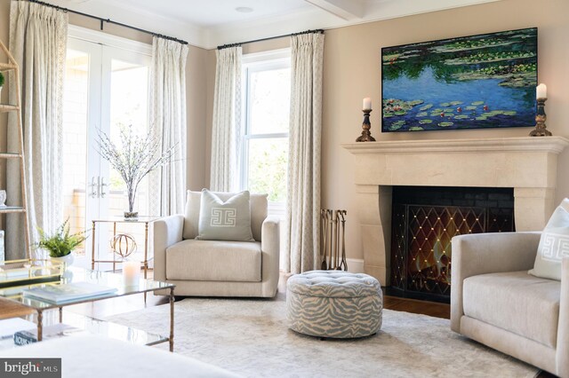 living area with hardwood / wood-style flooring