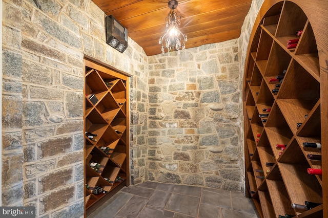 wine room with wooden ceiling