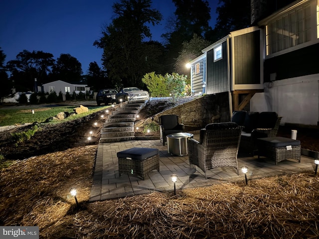 patio at night with an outdoor hangout area