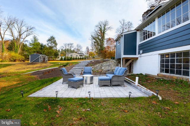 view of patio / terrace featuring a shed