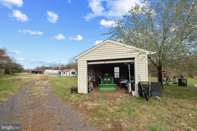 garage with a yard