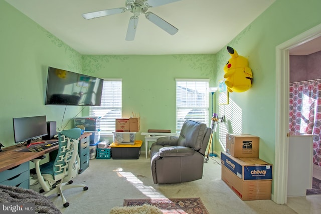 office with light colored carpet, ceiling fan, and plenty of natural light