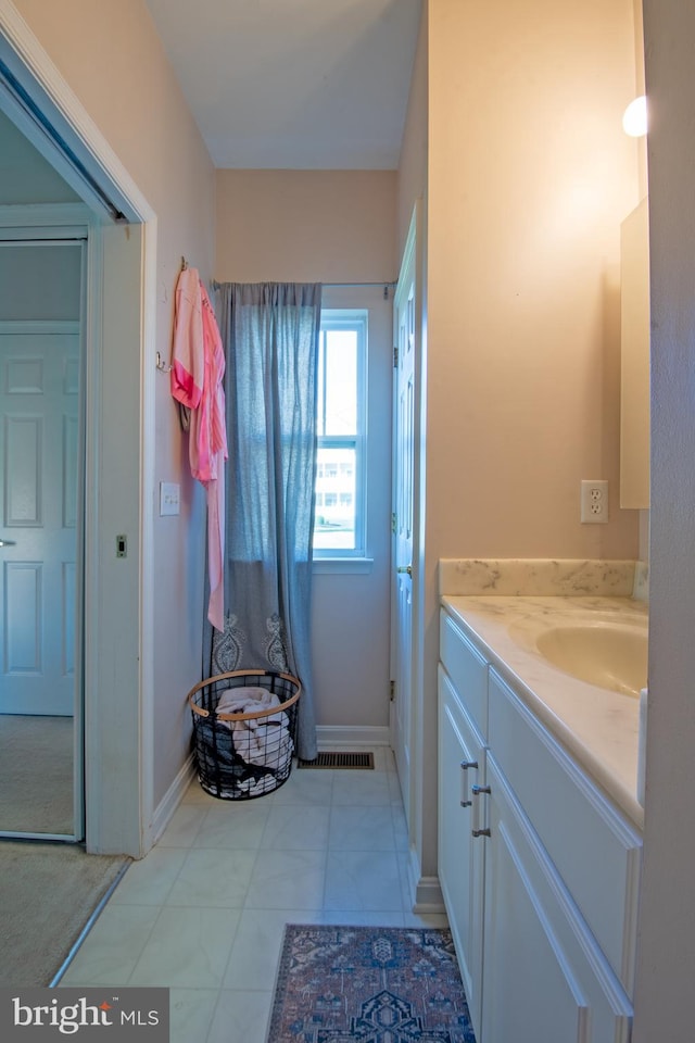 bathroom featuring vanity