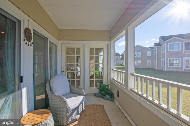 sunroom / solarium featuring plenty of natural light