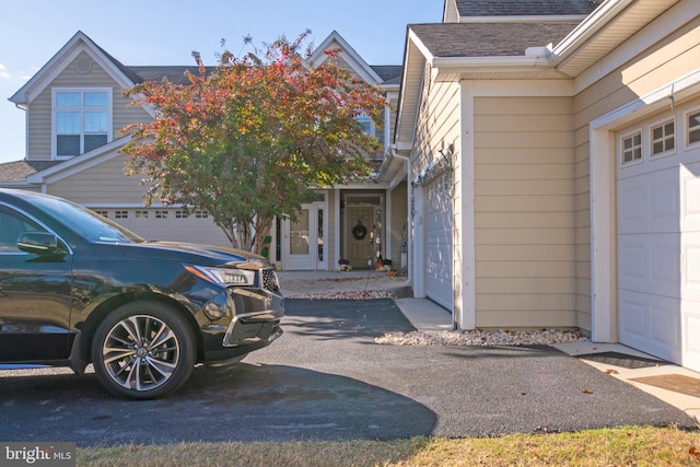 exterior space with a garage