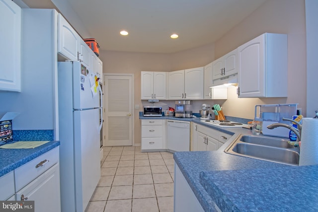 kitchen featuring white cabinetry, white appliances, sink, and light tile patterned flooring