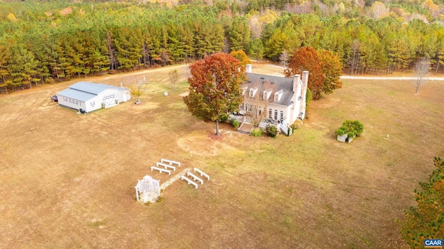 birds eye view of property with a rural view