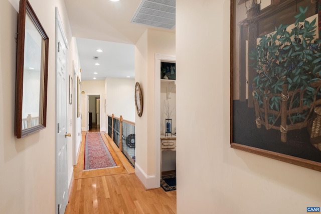 hall with light wood-type flooring