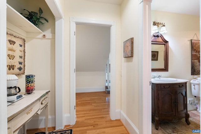 interior space with light wood-type flooring and sink