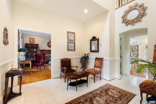 living area with light tile patterned floors