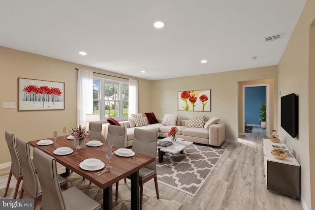 dining area featuring light hardwood / wood-style floors