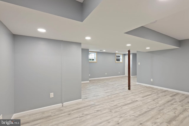 basement with light wood-type flooring