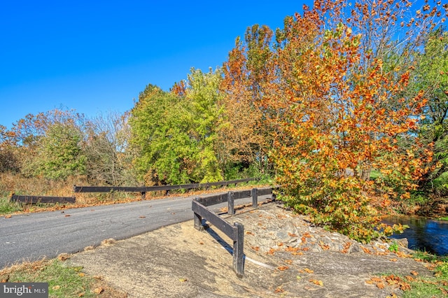 view of road featuring a water view