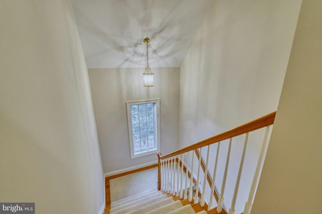 17061 Spring Creek Ln, Leesburg, VA 20176 - stairs featuring baseboards and a chandelier