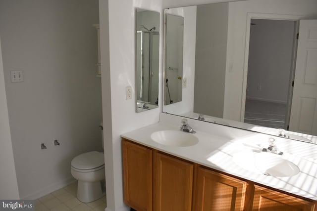 162 Liberty Way, Deptford, NJ 08096 - full bath with double vanity, baseboards, toilet, tile patterned floors, and an enclosed shower