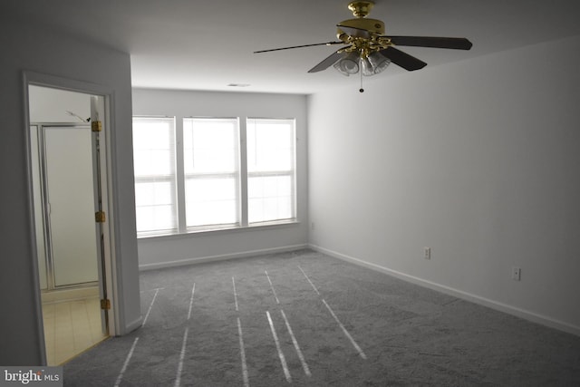 162 Liberty Way, Deptford, NJ 08096 - carpeted empty room featuring ceiling fan, plenty of natural light, and baseboards