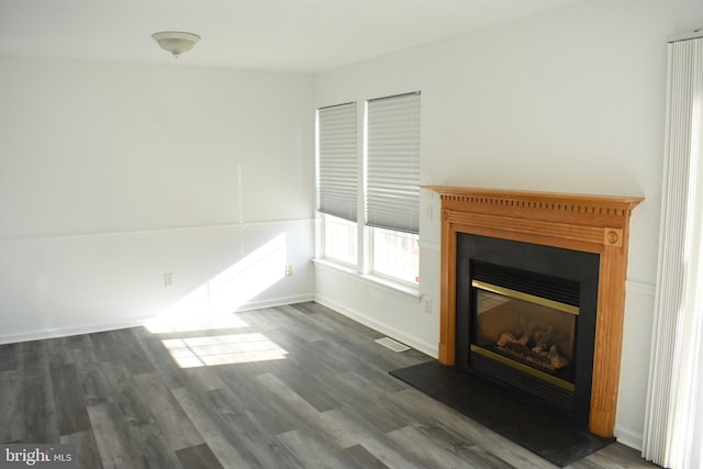 162 Liberty Way, Deptford, NJ 08096 - unfurnished living room featuring a glass covered fireplace, dark wood-style floors, and baseboards