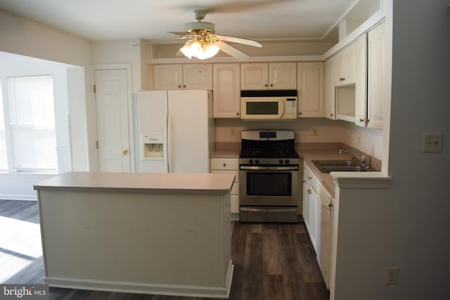 162 Liberty Way, Deptford, NJ 08096 - kitchen featuring white appliances, a sink, ceiling fan, dark wood-style flooring, and a kitchen island