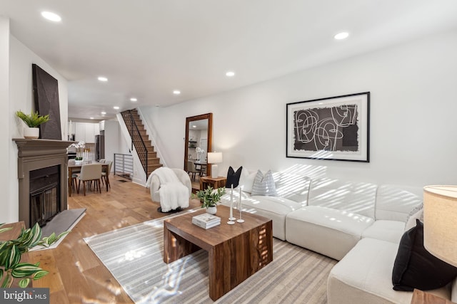 living room with light hardwood / wood-style flooring