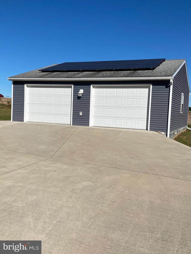 garage with solar panels