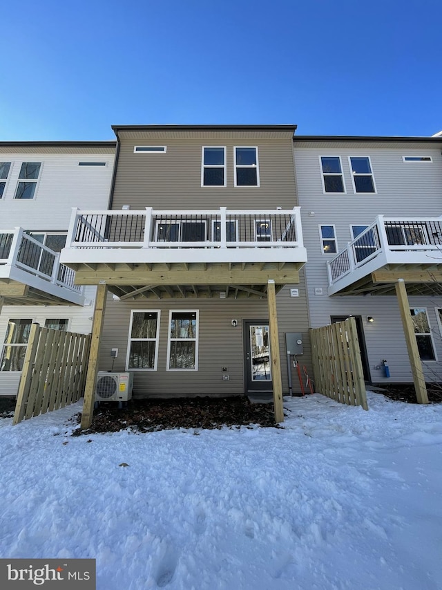 view of front of home with ac unit