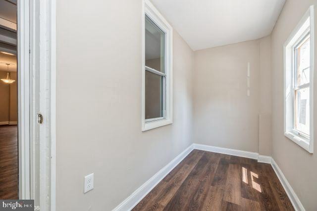 interior space featuring dark hardwood / wood-style flooring