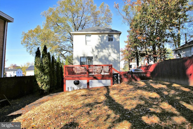 rear view of house with a deck