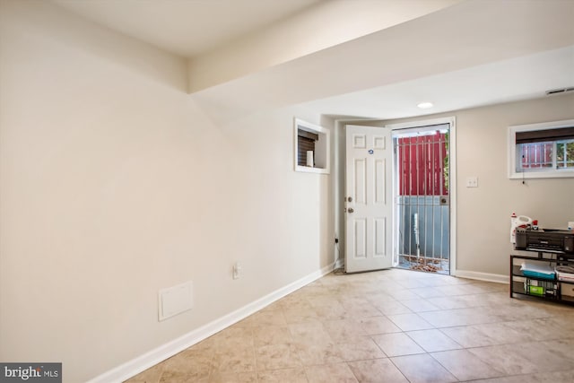 entrance foyer featuring light tile patterned floors