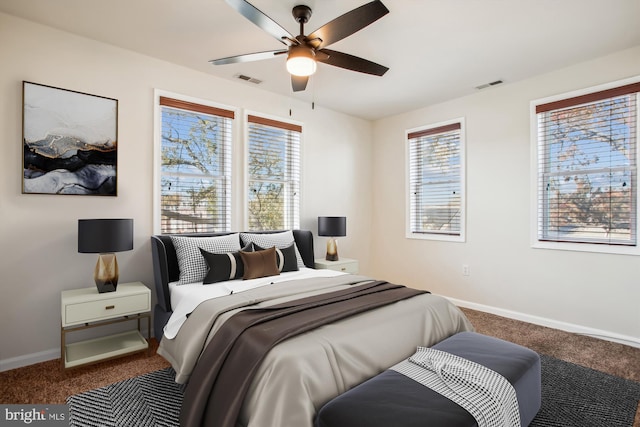 bedroom featuring ceiling fan and carpet floors