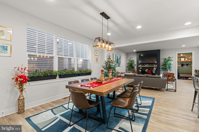 dining room featuring light hardwood / wood-style flooring