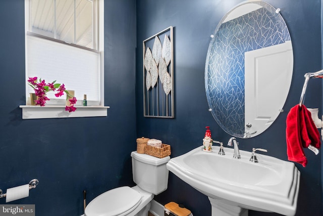 bathroom with sink and toilet