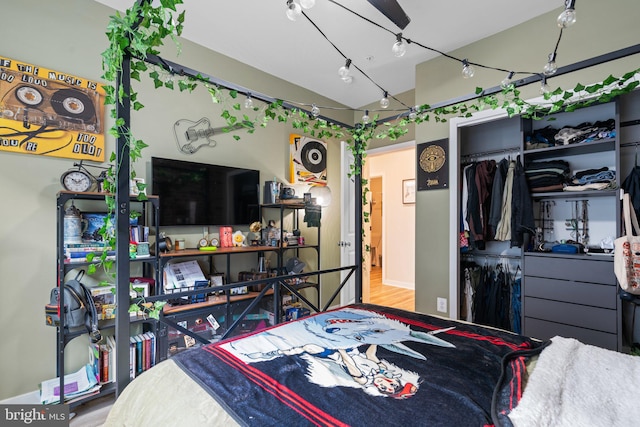 bedroom featuring hardwood / wood-style flooring and a closet