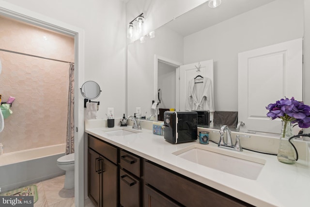 full bathroom featuring tile patterned floors, shower / bathtub combination with curtain, vanity, and toilet