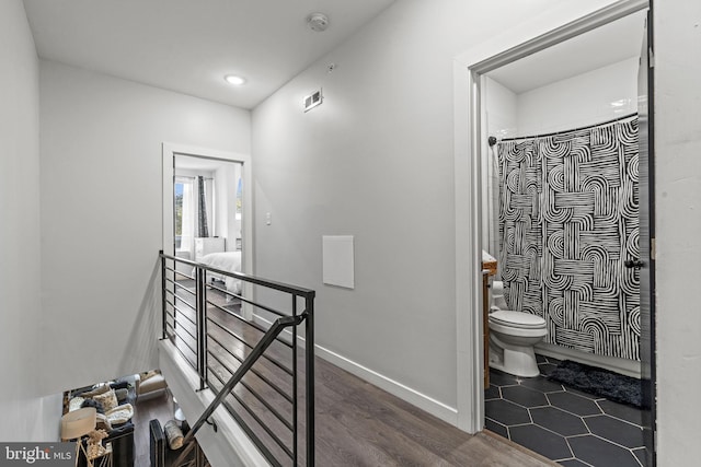 6127 Lebanon Ave, Philadelphia, PA 19151 - full bath featuring toilet, wood finished floors, a shower with shower curtain, recessed lighting, and baseboards