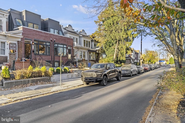 6127 Lebanon Ave, Philadelphia, PA 19151 - view of asphalt street with a residential view, sidewalks, and curbs